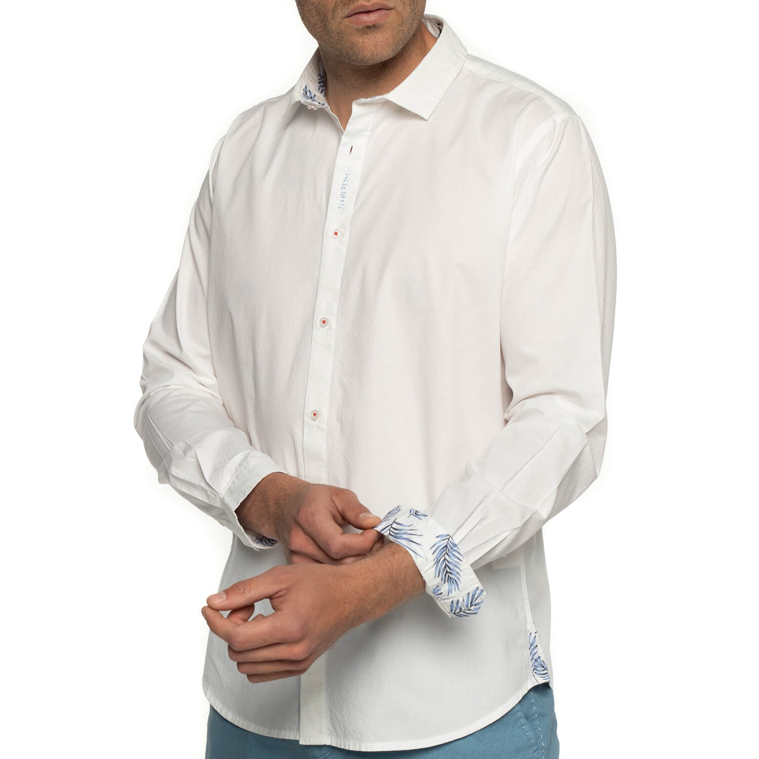 Chemise unie détails fleuris