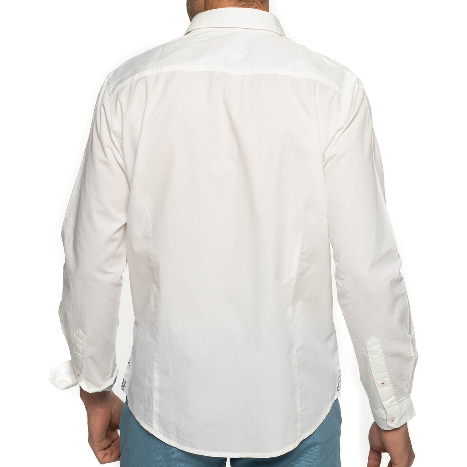 Chemise unie détails fleuris