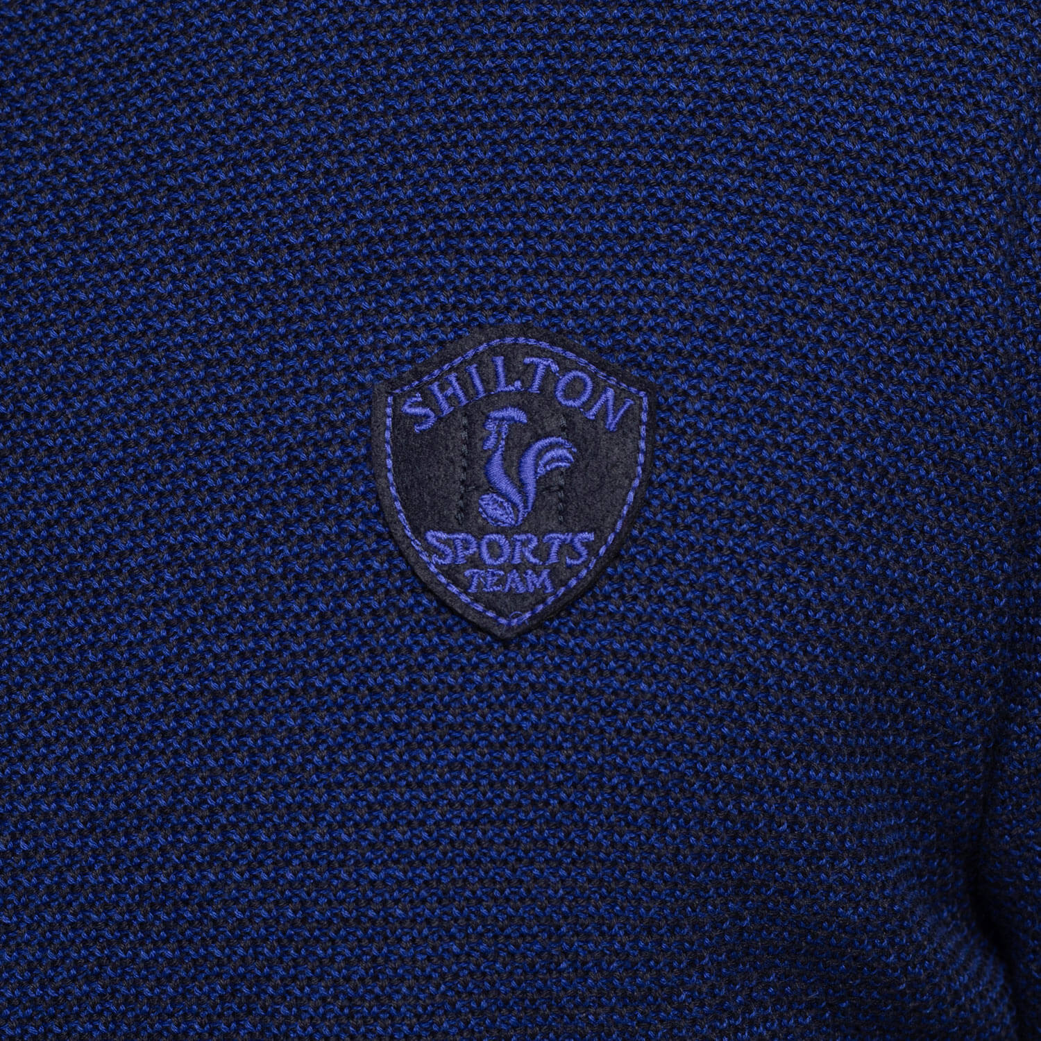 Pull col rond écusson