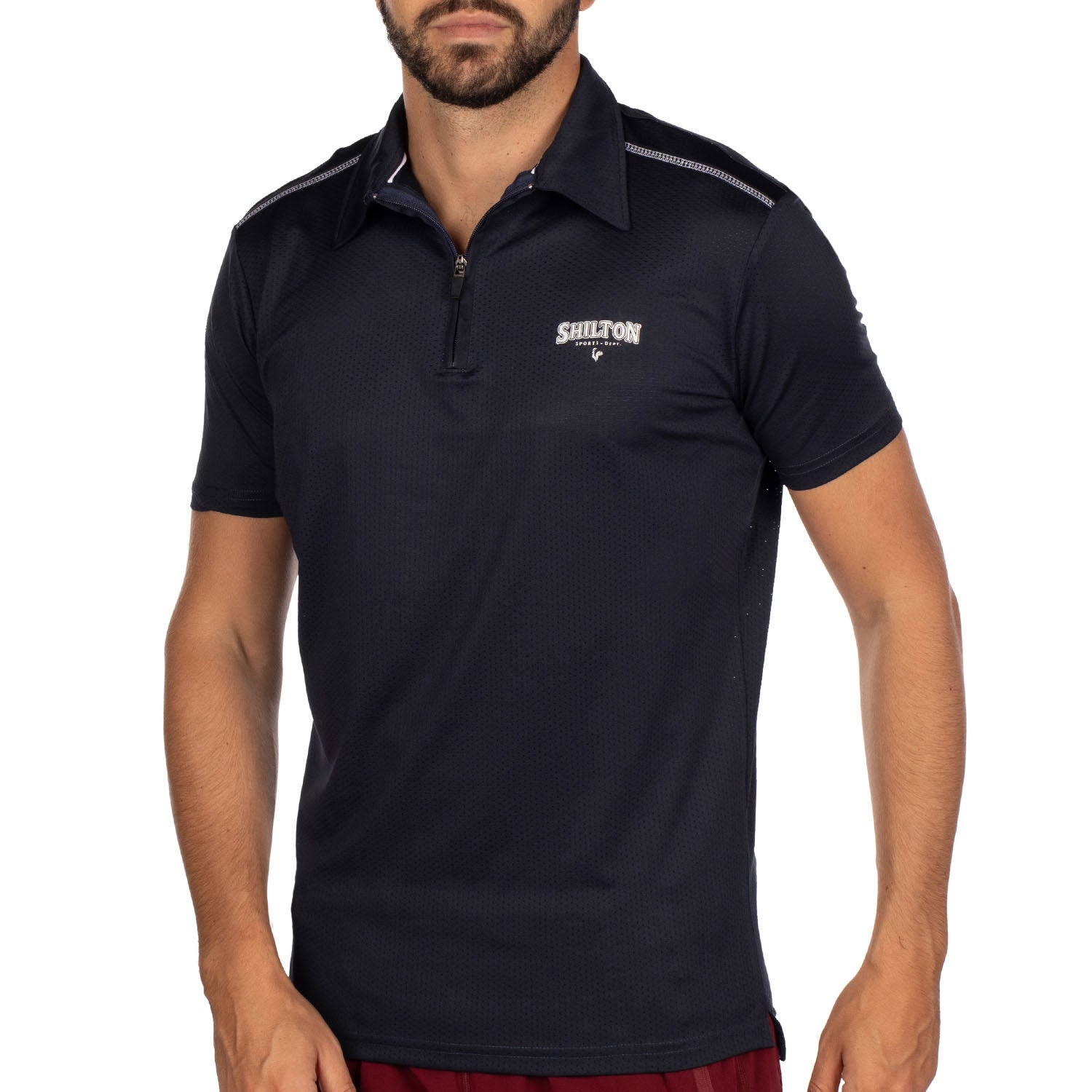 Polo de sport zippé perforé
