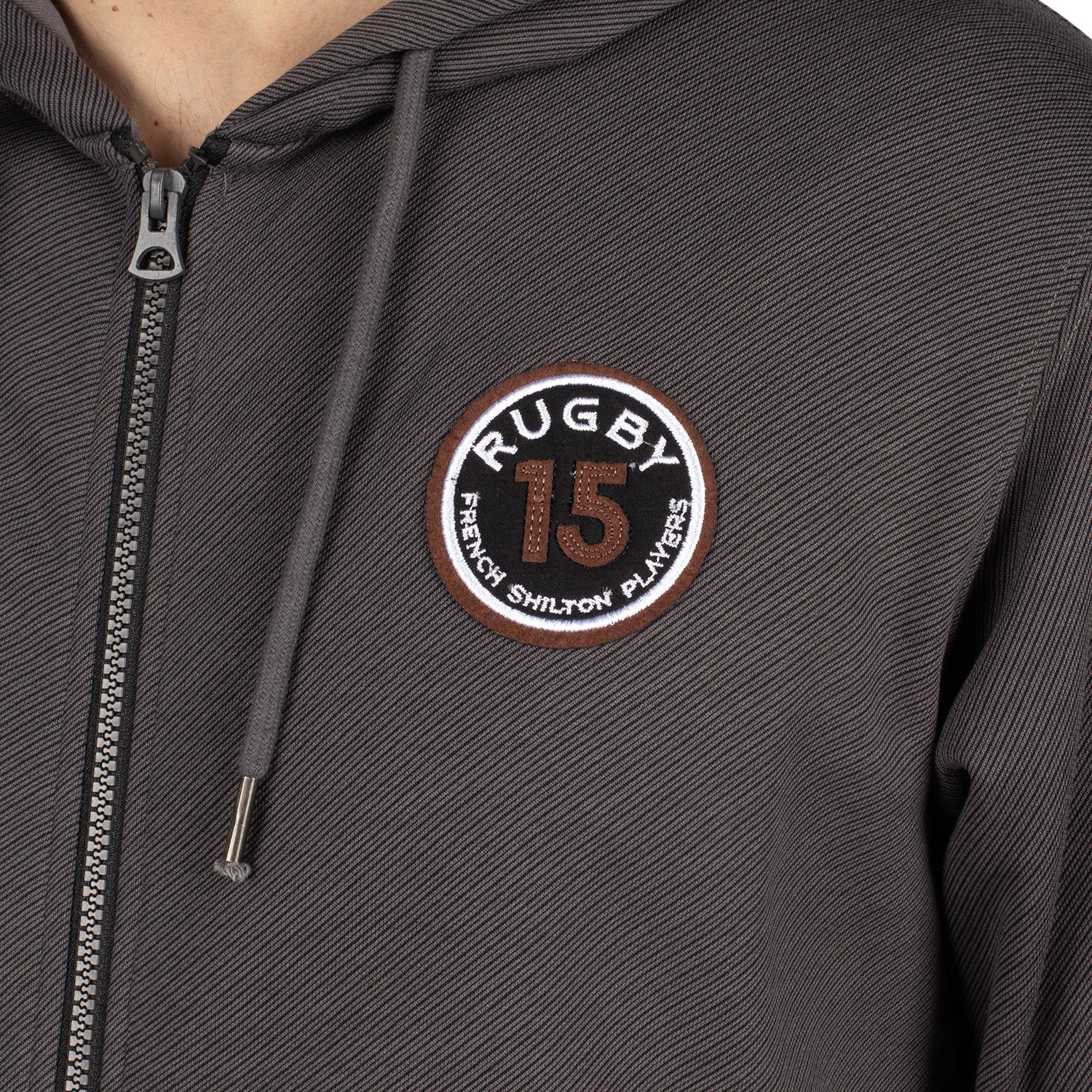 Hooded vest with crest